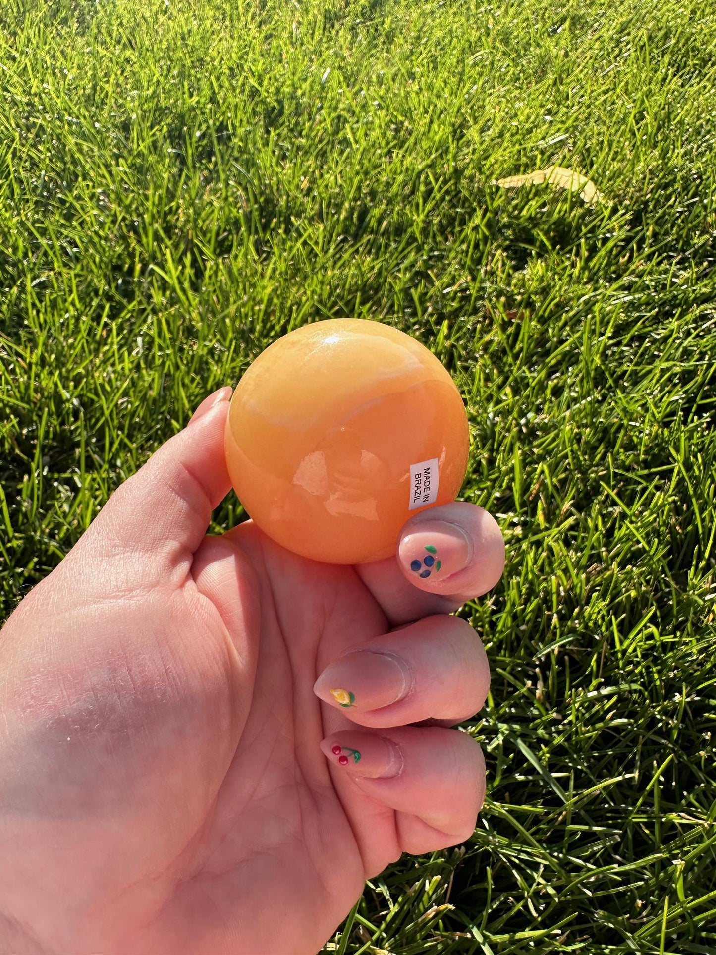 Orange Calcite Sphere – 2" Diameter, 8 oz – Joy, Creativity, and Emotional Healing Crystal