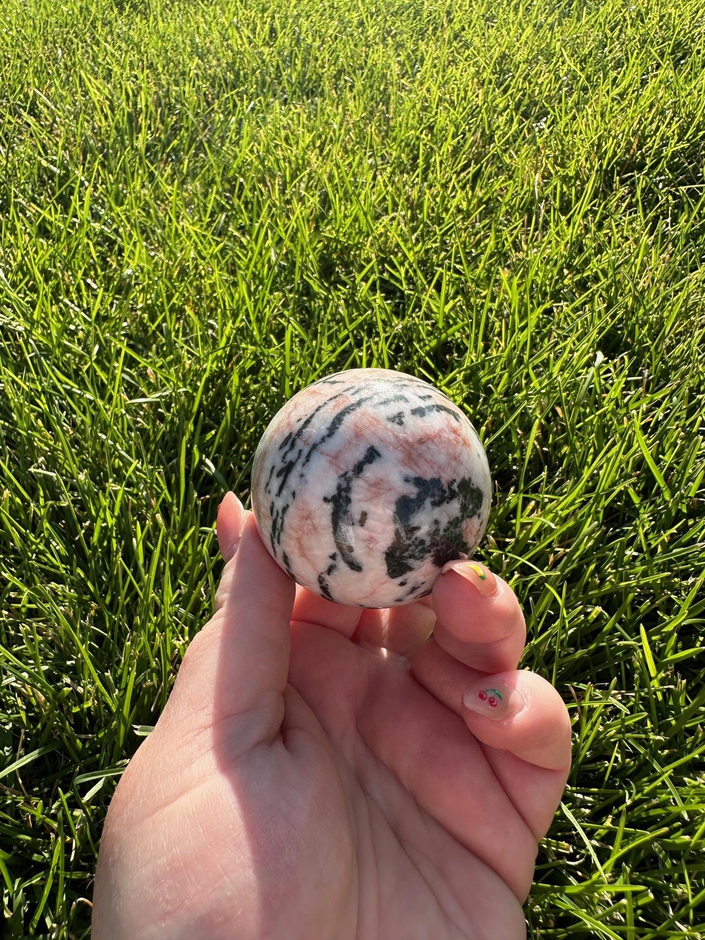 Pink Zebra Jasper Sphere – 1.9" Diameter, 9 oz – Grounding, Balance, and Compassion Crystal