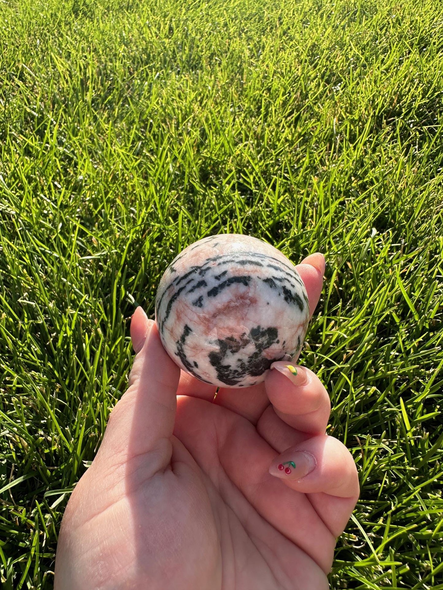 Pink Zebra Jasper Sphere – 1.9" Diameter, 9 oz – Grounding, Balance, and Compassion Crystal