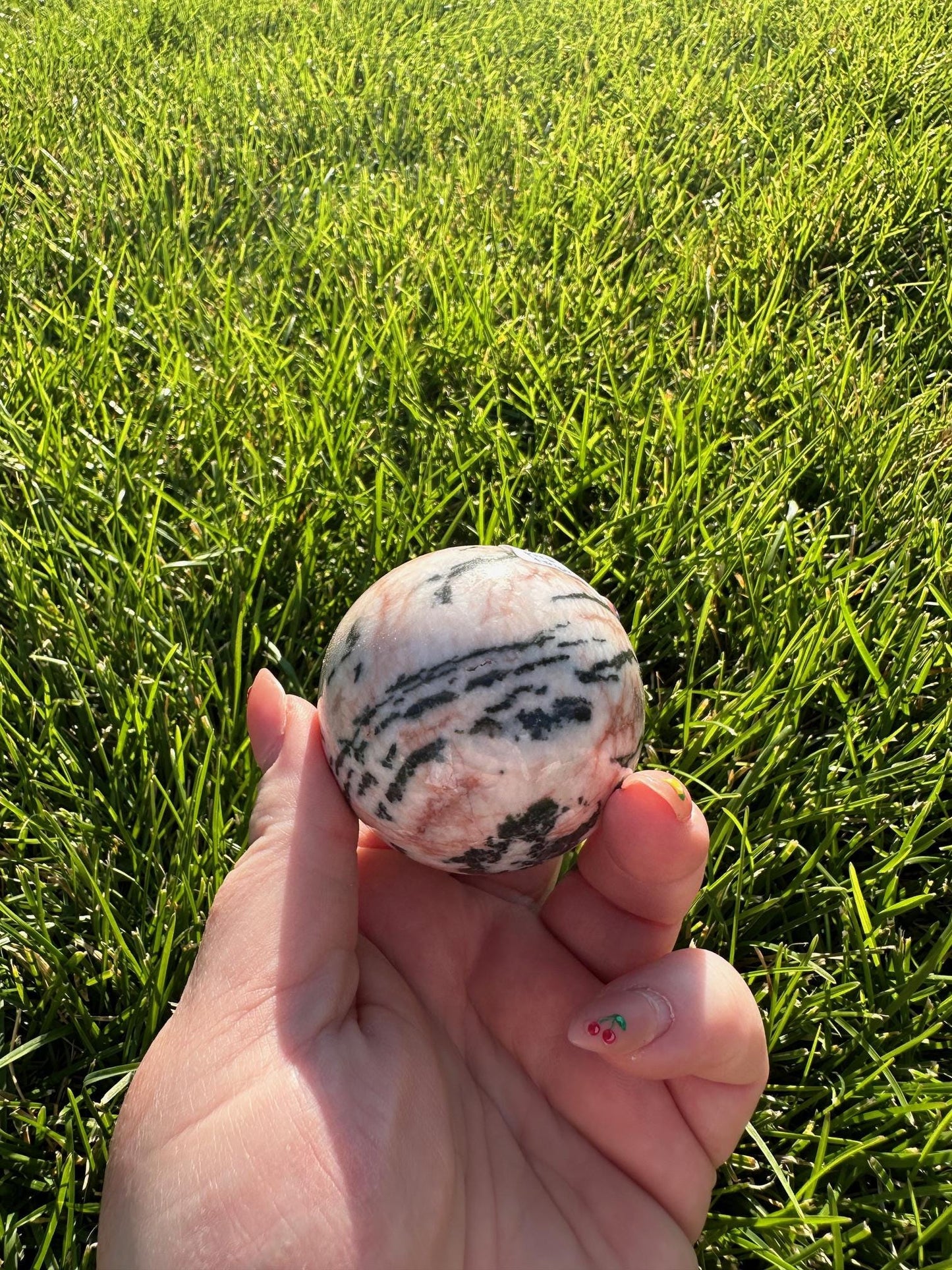 Pink Zebra Jasper Sphere – 1.9" Diameter, 9 oz – Grounding, Balance, and Compassion Crystal