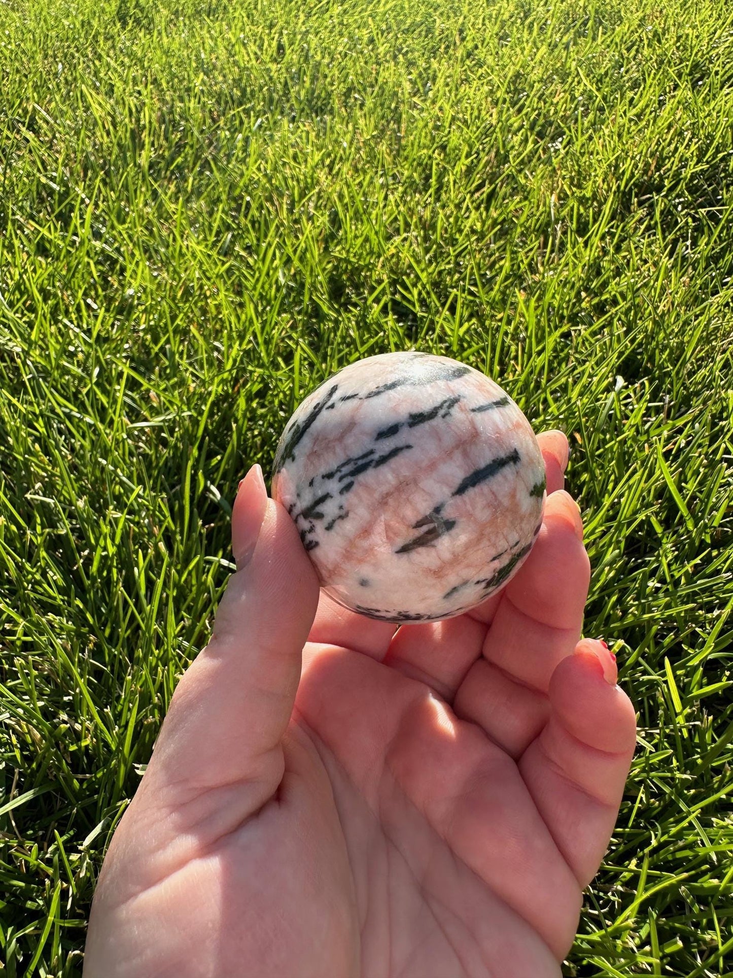 Pink Zebra Jasper Sphere – 1.9" Diameter, 9 oz – Grounding, Balance, and Compassion Crystal