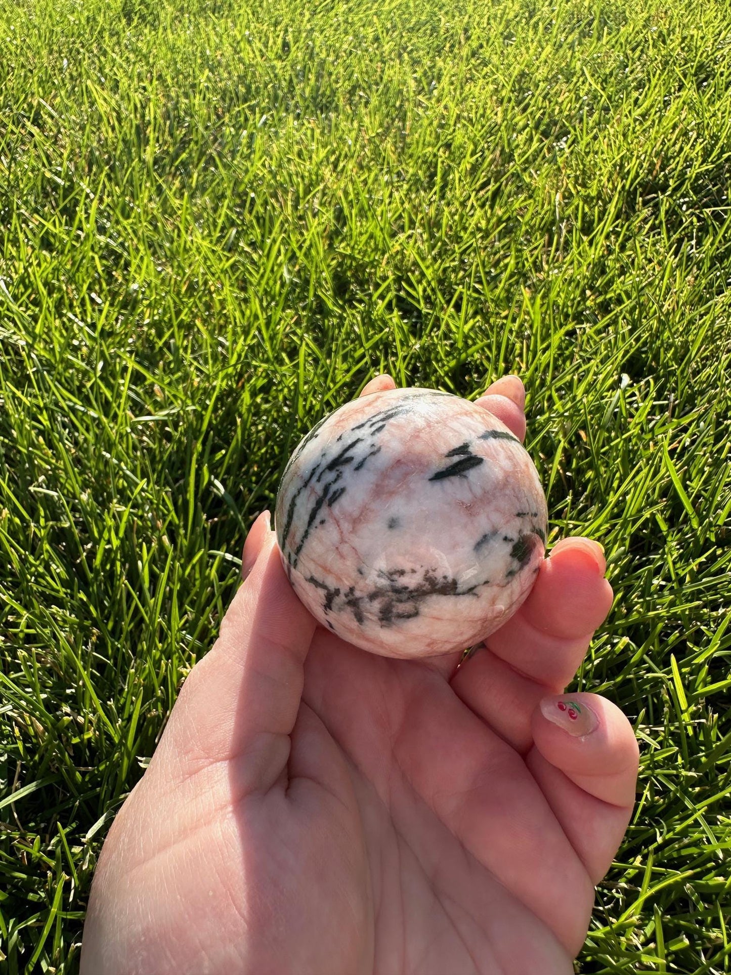 Pink Zebra Jasper Sphere – 1.9" Diameter, 9 oz – Grounding, Balance, and Compassion Crystal